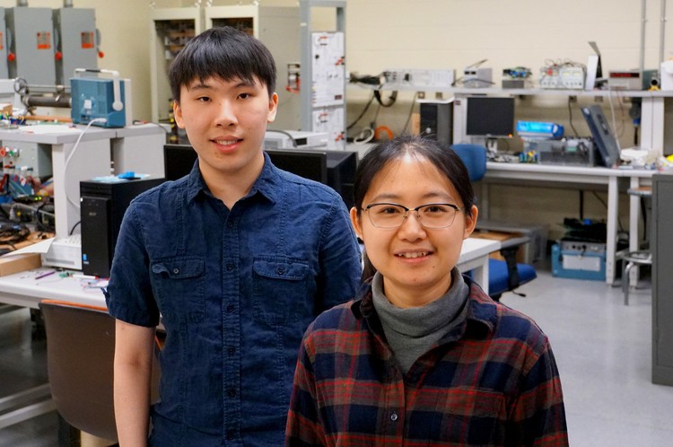 Graduate students Andrew Zhou and Tong Shi.