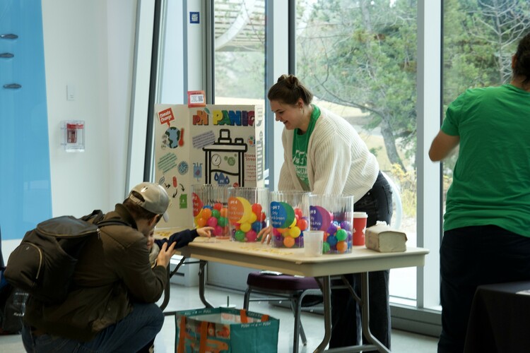 Energy Explorer Racheal Rieberger sets up her demonstration at TELUS World of Science - Edmonton