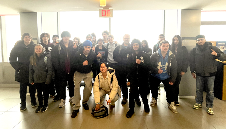 Visiting high school students pose for a group photo. [Image Credit: Inside Education]